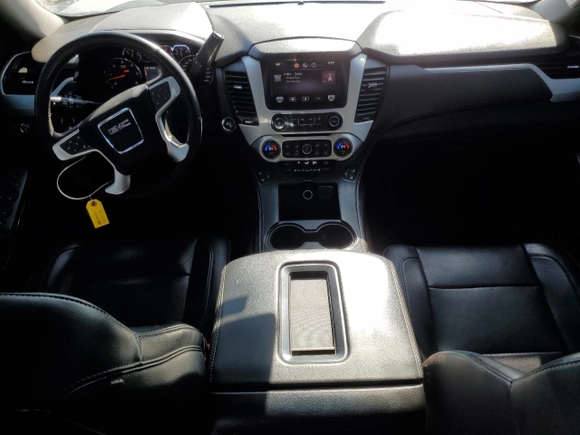 2015 GMC Yukon SLT z VIN 1GKS2BKC9FR147397, wystawiony jako Copart lot #53157845 z przebiegiem 131 552 mil mil oraz Szkoda całkowita • Salvage title. Historia ofert i sprzedaży dostępna na DreamBid. Obrazek 8.