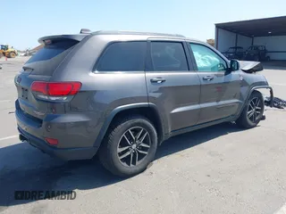 2017 Jeep Grand Cherokee Trailhawk with VIN 1C4RJFLG7HC654259, listed as a IAAI auction lot 42510197 with 103,947 mi miles and . Bid and sale history available at DreamBid. Image 4.