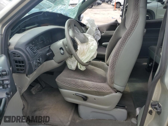 1999 Dodge Caravan with VIN 1B4GP45G7XB529075, listed as a Copart auction lot 60448215 with Not provided miles and Salvage title. Bid and sale history available at DreamBid. Image 7.