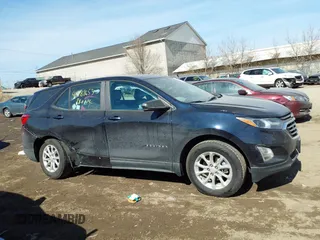 2020 Chevrolet Equinox LS z VIN 2GNAXSEV6L6145045, wystawiony jako IAAI lot #41781653 z przebiegiem 88 066 mil mil oraz . Historia ofert i sprzedaży dostępna na DreamBid. Obrazek 13.