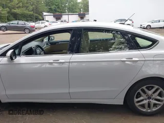 2016 Ford Fusion SE z VIN 3FA6P0H74GR197892, wystawiony jako IAAI lot #42471574 z przebiegiem 185 224 mil mil oraz . Historia ofert i sprzedaży dostępna na DreamBid. Obrazek 14.