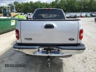 2000 Ford F-150 XL with VIN 1FTZF1727YNB38782, listed as a Copart auction lot 55749405 with 195,440 mi miles and Salvage title. Bid and sale history available at DreamBid. Image 6.