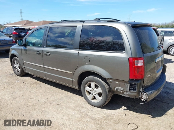 2010 Dodge Grand Caravan SXT with VIN 2D4RN5D1XAR293862, listed as a IAAI auction lot 42179737 with 324,144 mi miles and . Bid and sale history available at DreamBid. Image 3.