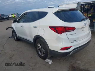 2017 Hyundai Santa Fe 2.4L z VIN 5XYZT3LB2HG412388, wystawiony jako IAAI lot #41174620 z przebiegiem 122 237 mil mil oraz . Historia ofert i sprzedaży dostępna na DreamBid. Obrazek 3.