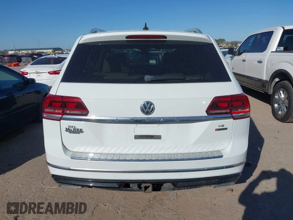 2018 Volkswagen Atlas SEL with VIN 1V2RR2CA1JC566065, listed as a IAAI auction lot 41687434 with 77,795 mi miles and . Bid and sale history available at DreamBid. Image 16.