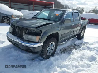2010 GMC Canyon SLE1 with VIN 1GTJTCDE6A8127051, listed as a IAAI auction lot 41366245 with 147,516 mi miles. Bid and sale history available at carsss.com. Image 2.