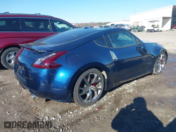 2014 Nissan 370Z Nismo with VIN JN1AZ4EH9EM635608, listed as a IAAI auction lot 41333034 with 45,354 mi miles and . Bid and sale history available at DreamBid. Image 4.