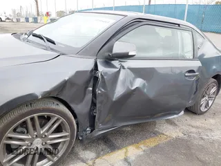 2013 Scion tC with VIN JTKJF5C76D3063500, listed as a IAAI auction lot 41916403 with 146,818 mi miles. Bid and sale history available at carsss.com. Image 13.