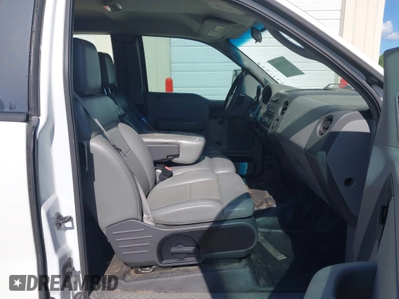 2007 Ford F-150 STX with VIN 1FTRX12W47FA49512, listed as a IAAI auction lot 42771332 with 203,687 mi miles and . Bid and sale history available at DreamBid. Image 5.