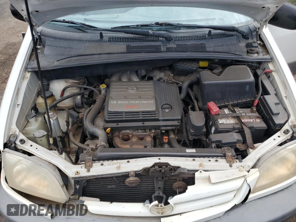 2001 Toyota Sienna CE with VIN 4T3ZF19C21U359632, listed as a Copart auction lot 60258414 with 167,356 mi miles and Salvage Title. Bid and sale history available at carsss.com. Image 12.