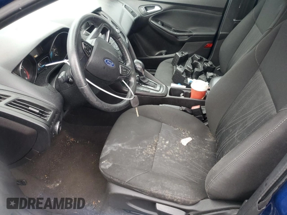 2018 Ford Focus SE z VIN 1FADP3FE2JL332464, wystawiony jako Copart lot #55649215 z przebiegiem 95 541 mil mil oraz Czysty tytuł • Clean title. Historia ofert i sprzedaży dostępna na DreamBid. Obrazek 7.