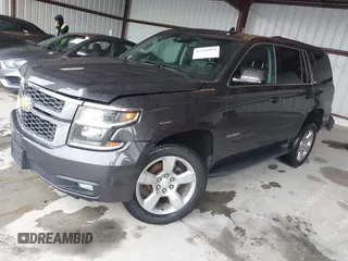 2017 Chevrolet Tahoe LT with VIN 1GNSKBKC8HR326004, listed as a IAAI auction lot 42256494 with 101,486 mi miles and . Bid and sale history available at DreamBid. Image 2.