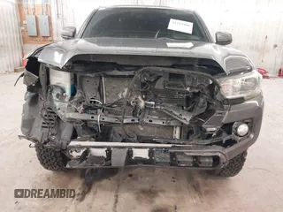 2016 Toyota Tacoma SR5 with VIN 3TMDZ5BN0GM012248, listed as a IAAI auction lot 41215908 with 170,756 mi miles and . Bid and sale history available at DreamBid. Image 6.