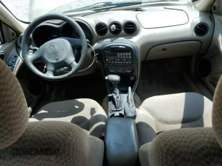 2004 Pontiac Grand Am SE1 with VIN 1G2NF52E74M568873, listed as a Copart auction lot 56187005 with 107,037 mi miles and Salvage title. Bid and sale history available at DreamBid. Image 8.