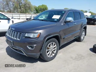 2014 Jeep Grand Cherokee Limited z VIN 1C4RJFBT0EC241030, wystawiony jako IAAI lot #41851316 z przebiegiem 104 344 mil mil oraz . Historia ofert i sprzedaży dostępna na DreamBid. Obrazek 21.