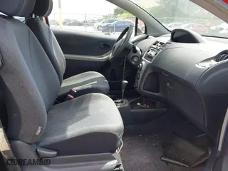 2009 Toyota Yaris with VIN JTDJT903295224512, listed as a IAAI auction lot 42088967 with 165,918 mi miles. Bid and sale history available at carsss.com. Image 5.
