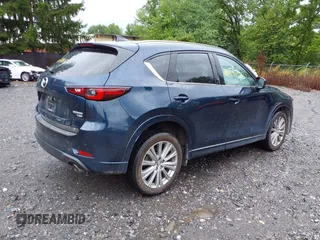 2023 Mazda CX-5 Signature with VIN JM3KFBXY4P0153335, listed as a IAAI auction lot 40053867 with 17,828 mi miles and . Bid and sale history available at carsss.com. Image 4.