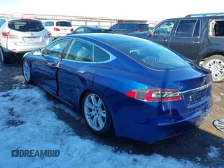 2020 Tesla Model S Long Range with VIN 5YJSA1E26LF410779, listed as a IAAI auction lot 41241192 with 68,764 mi miles and . Bid and sale history available at DreamBid. Image 3.