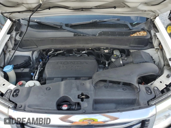 2013 Honda Pilot Touring z VIN 5FNYF3H9XDB044620, wystawiony jako Copart lot #58038505 z przebiegiem 172 096 mil mil oraz Szkoda całkowita • Salvage title. Historia ofert i sprzedaży dostępna na DreamBid. Obrazek 12.