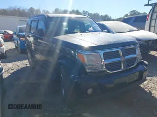 2007 Dodge Nitro SLT with VIN 1D8GU58K87W555759, listed as a IAAI auction lot 41690213 with 196,779 mi miles. Bid and sale history available at carsss.com. Image 1.