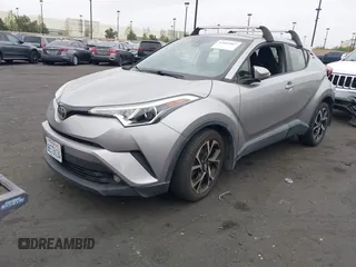 2018 Toyota C-HR XLE with VIN JTNKHMBX5J1011568, listed as a IAAI auction lot 42043867 with 30,699 mi miles. Bid and sale history available at carsss.com. Image 2.