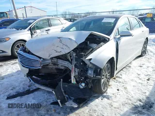 2013 Lincoln MKZ with VIN 3LN6L2J95DR803074, listed as a IAAI auction lot 41331345 with 151,433 mi miles. Bid and sale history available at carsss.com. Image 6.