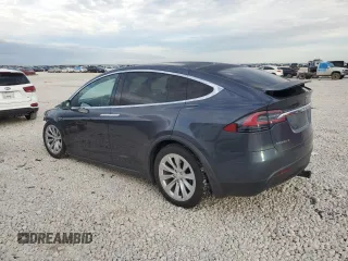 2016 Tesla Model X 70D with VIN 5YJXCAE22GF002253, listed as a Copart auction lot 50700425 with 153,258 mi miles and Salvage Title. Bid and sale history available at carsss.com. Image 2.