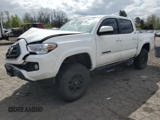 2022 Toyota Tacoma SR z VIN 3TMCZ5AN8NM515939, wystawiony jako Copart lot #52215565 z przebiegiem 30 581 mil mil oraz Szkoda całkowita • Salvage title. Historia ofert i sprzedaży dostępna na DreamBid. Obrazek 1.