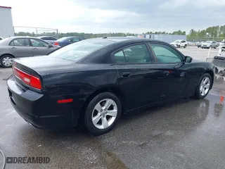 2013 Dodge Charger SE with VIN 2C3CDXBG6DH526840, listed as a IAAI auction lot 41929002 with 273,890 mi miles. Bid and sale history available at carsss.com. Image 4.