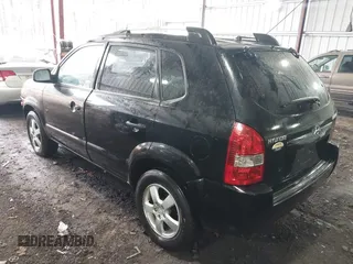 2005 Hyundai Tucson GL with VIN KM8JM12B75U072080, listed as a IAAI auction lot 41779464 with 191,771 mi miles. Bid and sale history available at carsss.com. Image 3.