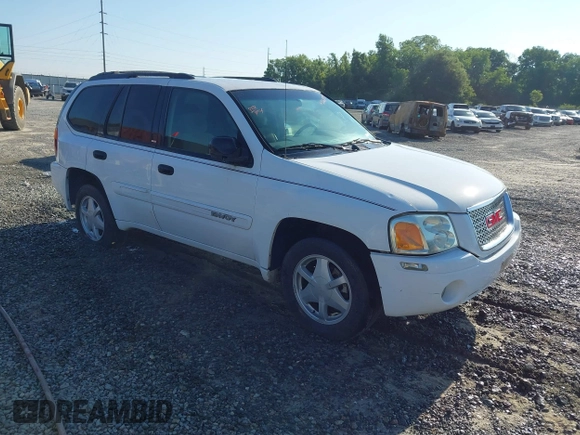 2003 GMC Envoy SLE z VIN 1GKDS13S732151378, wystawiony jako IAAI lot #42264018 z przebiegiem 213 523 mil mil oraz . Historia ofert i sprzedaży dostępna na DreamBid. Obrazek 1.