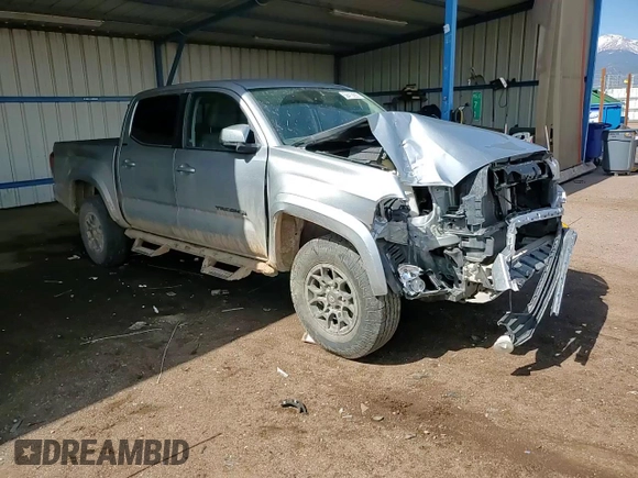 2022 Toyota Tacoma SR z VIN 3TMCZ5AN2NM470545, wystawiony jako Copart lot #58419285 z przebiegiem 57 599 mil mil oraz Szkoda całkowita • Salvage title. Historia ofert i sprzedaży dostępna na DreamBid. Obrazek 13.