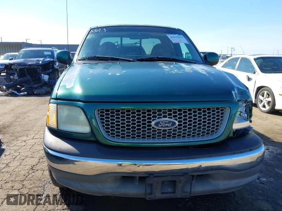 1999 Ford F-150 XL with VIN 1FTRX17L3XNC30010, listed as a IAAI auction lot 41632812 with 268,884 mi miles. Bid and sale history available at carsss.com. Image 12.