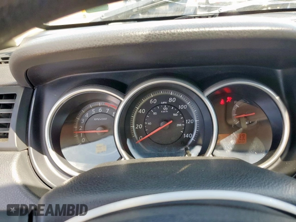 2010 Nissan Versa 1.6 with VIN 3N1CC1AP5AL403629, listed as a Copart auction lot 58264865 with 86,399 mi miles and Salvage title. Bid and sale history available at DreamBid. Image 9.