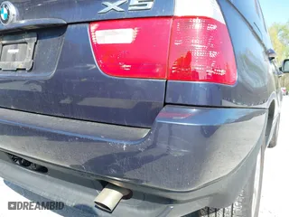 2005 BMW X5 3.0i with VIN 5UXFA13505LY15694, listed as a IAAI auction lot 42051677 with 104,559 mi miles. Bid and sale history available at carsss.com. Image 13.