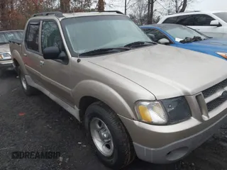 2003 Ford Explorer Sport Trac XLS z VIN 1FMZU67E43UA65832, wystawiony jako IAAI lot #41556498 z przebiegiem 282 859 mil mil oraz . Historia ofert i sprzedaży dostępna na DreamBid. Obrazek 1.