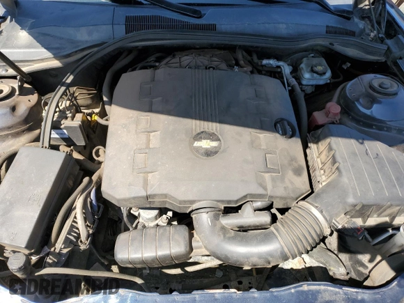 2013 Chevrolet Camaro LS z VIN 2G1FE1E3XD9172724, wystawiony jako Copart lot #50713835 z przebiegiem 110 067 mil mil oraz Szkoda całkowita • Salvage title. Historia ofert i sprzedaży dostępna na DreamBid. Obrazek 11.