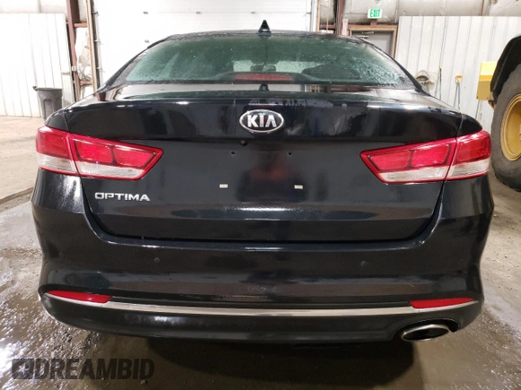 2018 Kia Optima LX с VIN 5XXGT4L33JG268768, выставлен на аукционе Copart как лот 53918815 с пробегом 61 206 миль миль и Списание • Salvage title. История ставок и продаж доступна на DreamBid. Изображение 6.