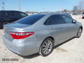 2015 Toyota Camry Hybrid LE with VIN 4T1BD1FKXFU159875, listed as a IAAI auction lot 42041323 with 240,779 mi miles. Bid and sale history available at carsss.com. Image 4.