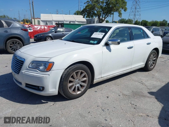 2014 Chrysler 300 with VIN 2C3CCAET6EH173381, listed as a IAAI auction lot 42158270 with 124,551 mi miles. Bid and sale history available at carsss.com. Image 2.