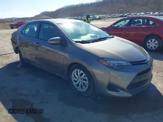 2019 Toyota Corolla L z VIN 5YFBURHE1KP905180, wystawiony jako IAAI lot #41888604 z przebiegiem 105 676 mil mil oraz . Historia ofert i sprzedaży dostępna na DreamBid. Obrazek 1.