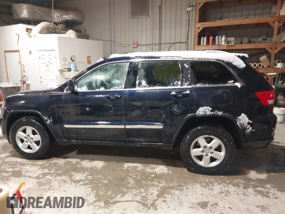 2011 Jeep Grand Cherokee Laredo with VIN 1J4RR4GG3BC640075, listed as a IAAI auction lot 41712754 with 190,199 mi miles. Bid and sale history available at carsss.com. Image 14.