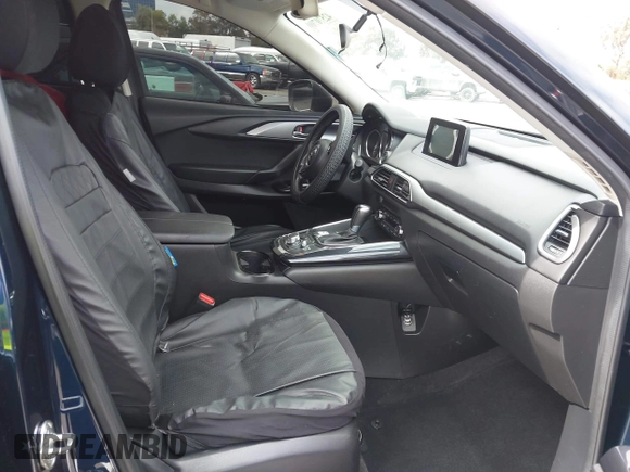 2016 Mazda CX-9 Sport with VIN JM3TCABY3G0123239, listed as a IAAI auction lot 42570700 with 119,414 mi miles and . Bid and sale history available at DreamBid. Image 5.