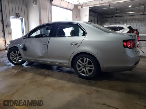 2009 Volkswagen Jetta z VIN 3VWAL71KX9M072304, wystawiony jako Copart lot #57027785 z przebiegiem 191 554 mil mil oraz Szkoda całkowita • Salvage title. Historia ofert i sprzedaży dostępna na DreamBid. Obrazek 2.