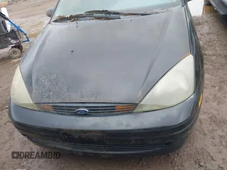 2004 Ford Focus SE with VIN 1FAFP34394W114485, listed as a IAAI auction lot 42737378 with 104,817 mi miles and . Bid and sale history available at DreamBid. Image 6.