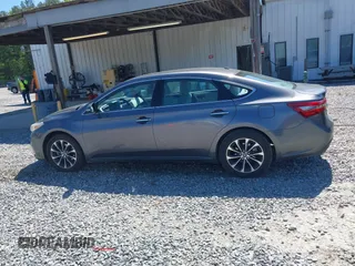 2016 Toyota Avalon Limited with VIN 4T1BK1EB4GU208979, listed as a IAAI auction lot 42032374 with 242,738 mi miles and . Bid and sale history available at carsss.com. Image 14.