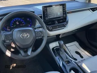 2021 Toyota Corolla Hybrid LE with VIN JTDEAMDE0MJ009233, listed as a Copart auction lot 47051805 with 212,244 mi miles and Clean Title. Bid and sale history available at carsss.com. Image 14.