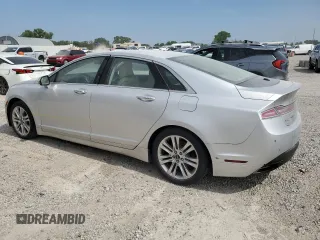 2014 Lincoln MKZ с VIN 3LN6L2G9XER816671, выставлен на аукционе Copart как лот 59883485 с пробегом 170 845 миль миль и Списание • Salvage title. История ставок и продаж доступна на DreamBid. Изображение 2.