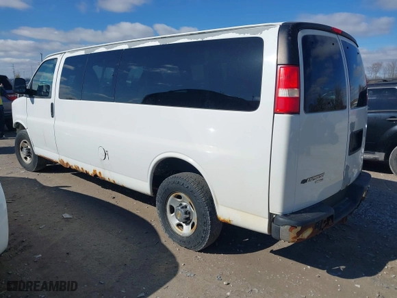 2012 Chevrolet Express Passenger 1LT with VIN 1GAZG1FG7C1157478, listed as a IAAI auction lot 41790091 with 169,173 mi miles. Bid and sale history available at carsss.com. Image 3.