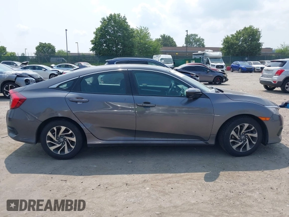 2018 Honda Civic EX с VIN 2HGFC2F74JH589988, выставлен на аукционе IAAI как лот 42443284 с пробегом 206 986 миль миль и . История ставок и продаж доступна на DreamBid. Изображение 13.